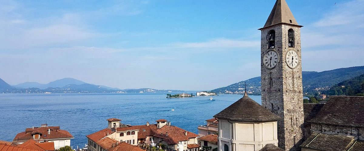 View of Lake Maggiore in Northern Italy, delightful little village Baveno and its church.