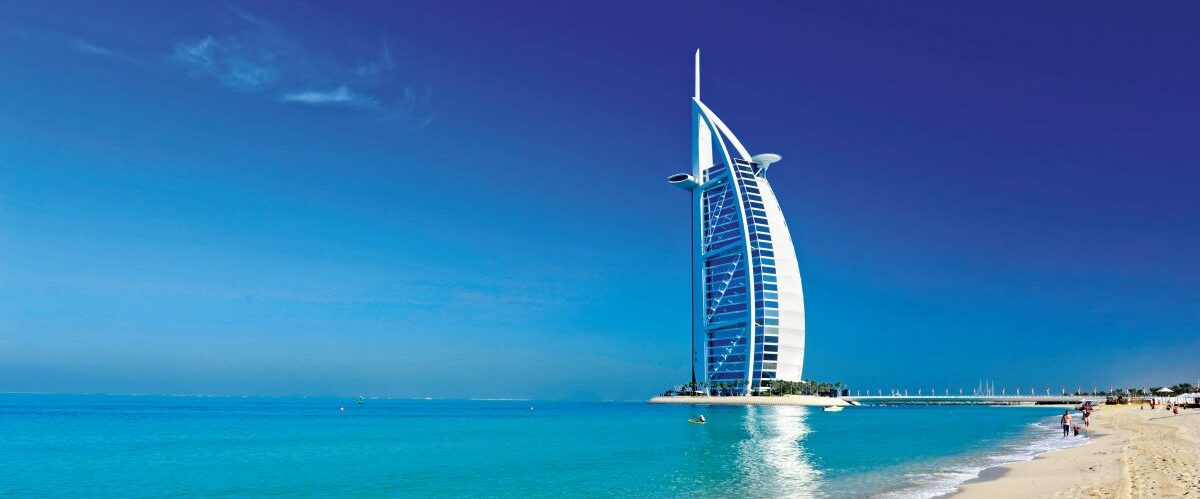 Luxurious hotel Burj Al Arab seen from the Jumeirah beach, Dubai - United Arab Emirates
