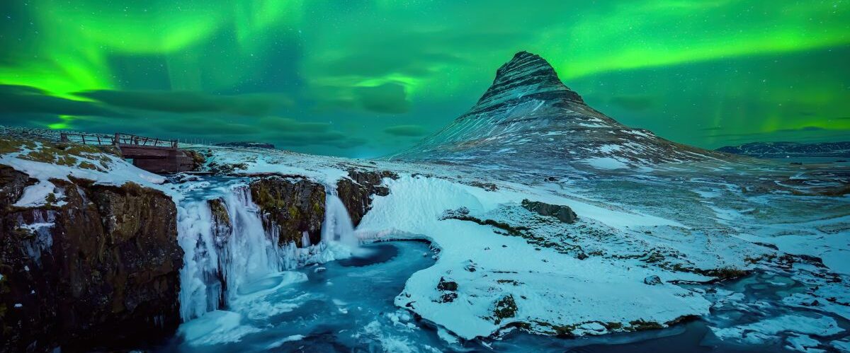 Aurora,Borealis,Or,Northern,Lights,Over,Kirkjufell,Mountain,In,Iceland