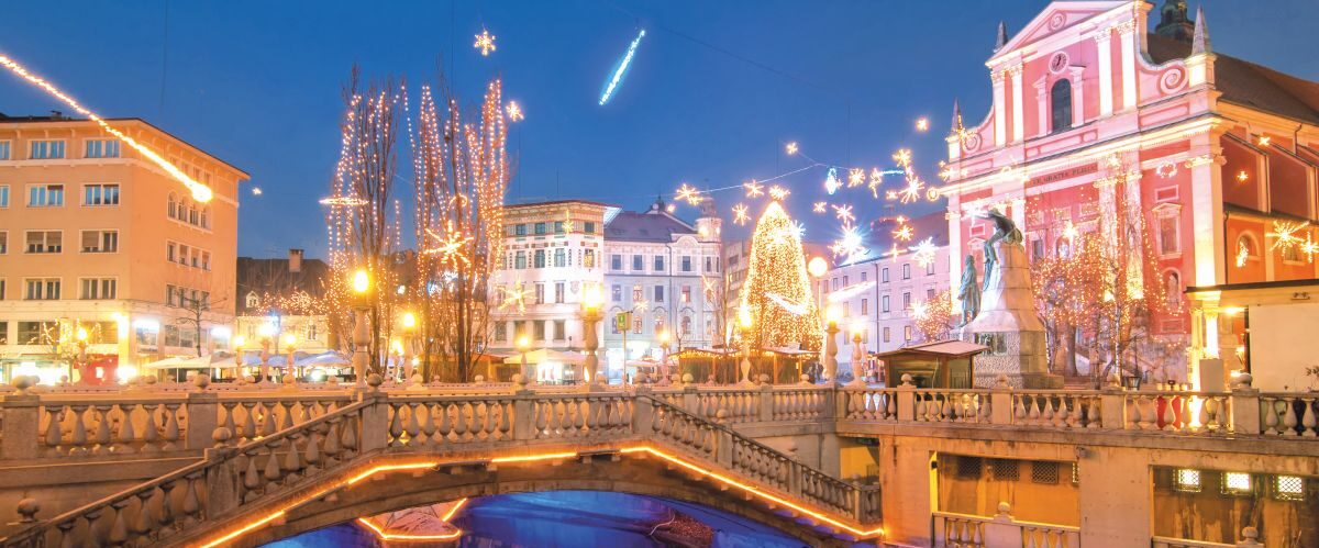 Triple bridge, illuminated for New Years celebration, Ljubljana,